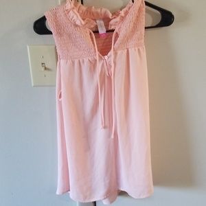 Sleeveless pink sheer top
